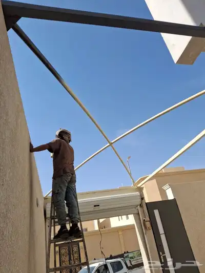 حداد تركيب مظلات كوري معا الضمان حتى2034 4