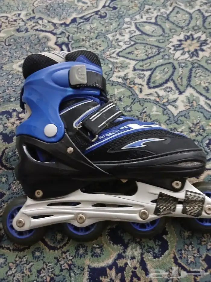 حذاء تزلج فيه كفرات 1