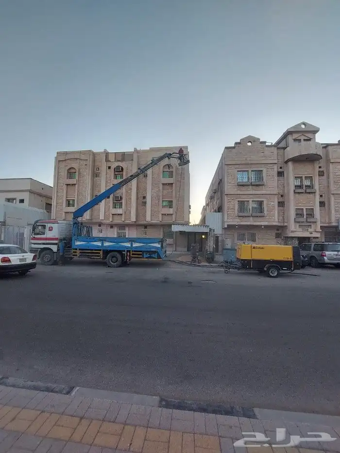 ازالهةالصبغ القديم بالرمل وتخشين خرسانه وسنفرت حديد وتنظيف ح 1