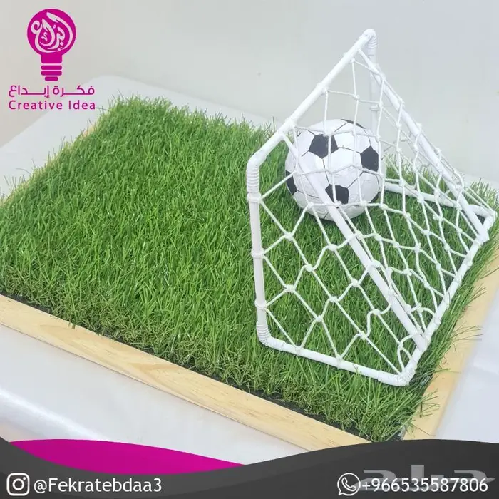 قاعدة ستاند هدايا على شكل ملعب كرة قدم مصغر 1