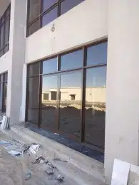 شركة عزالنخبة للوجهات الخارجيه زجاج. كلادينج 1