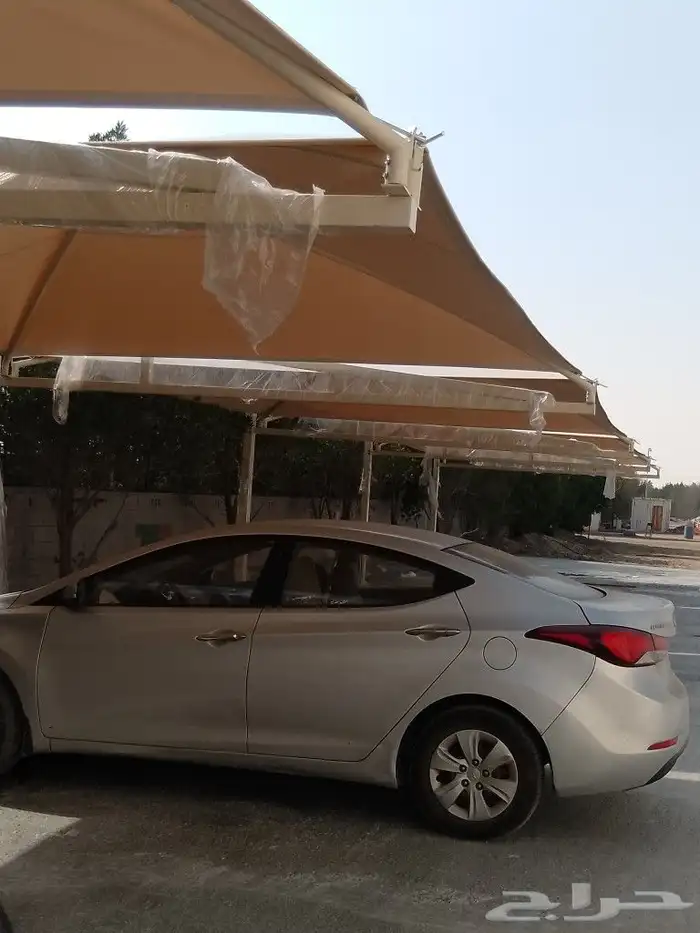 حداد مظلات مواقف سيارات 0