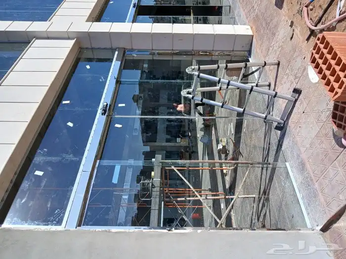 تركيب الابواب الاتومتيك والزجاج السكوريت 5