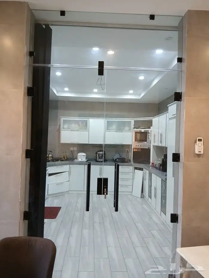 تركيب الابواب الاتومتيك والزجاج السكوريت 3