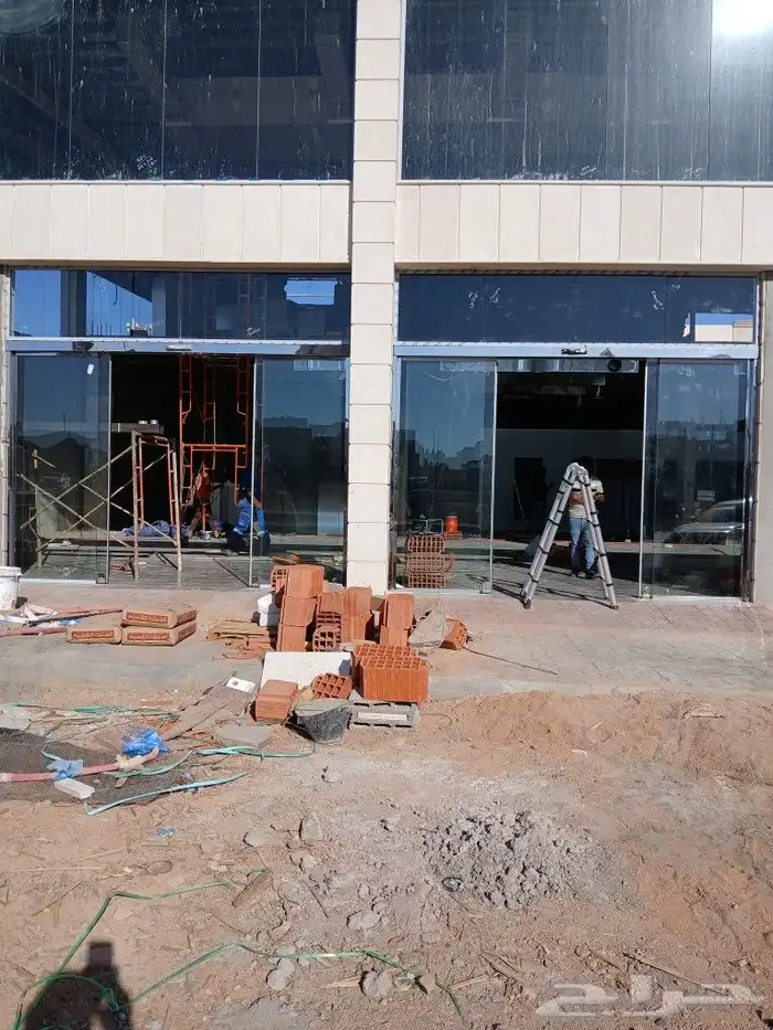 تركيب الابواب الاتومتيك والزجاج السكوريت 0