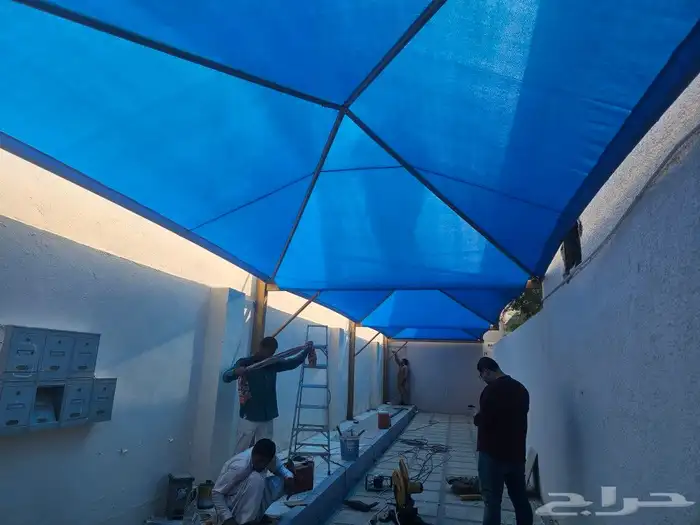 مظلات سيارت وسواتر 23