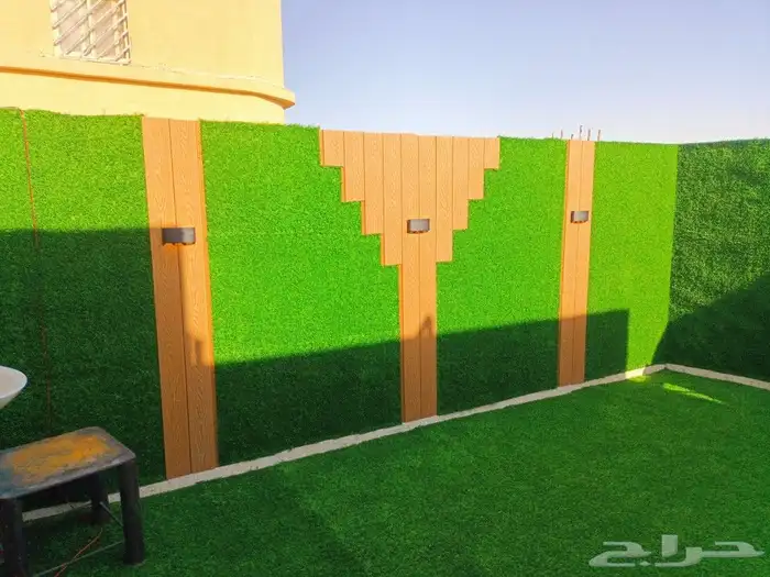 تكسيات جداريه وعشب صناعي وتصميم مظلات 4