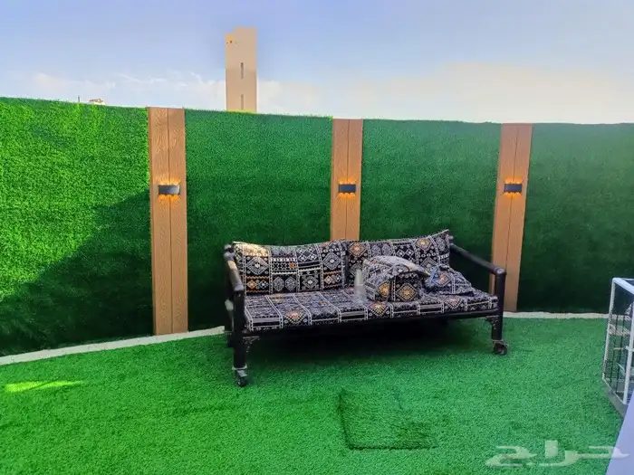 تكسيات جداريه وعشب صناعي وتصميم مظلات 2