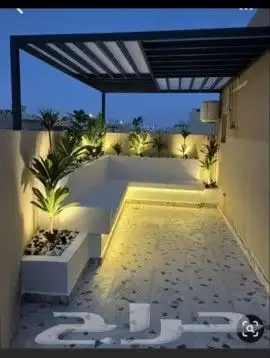 تكسيات جداريه وعشب صناعي وتصميم مظلات 1