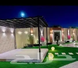 تنسيق حدائق عامه وتكسيات جداريه وعشب صناعي 3