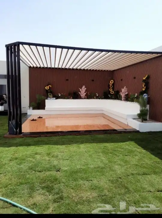 تنسيق حدائق عامه وتكسيات جداريه وعشب صناعي 1