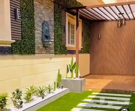 تصميم حدائق عشب جداري ديكورات خشب مظلة شلال جلسه تكسيات بديل 5