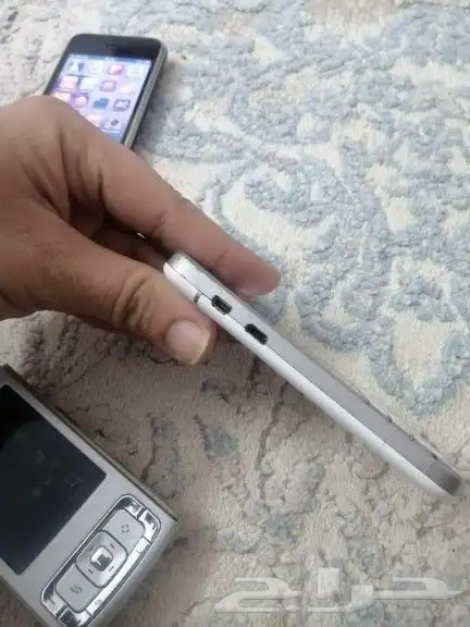 اول جوال ايفون و نوكيا n95 وبلاك بيري Q10 مخزنه 4