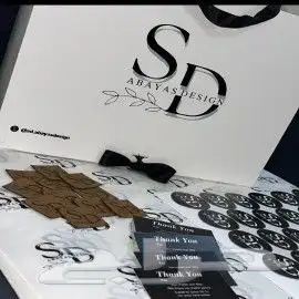 مطبعة طباعة بكجات عباية ورق تغليف استكر كروت ليبل اكواب 2