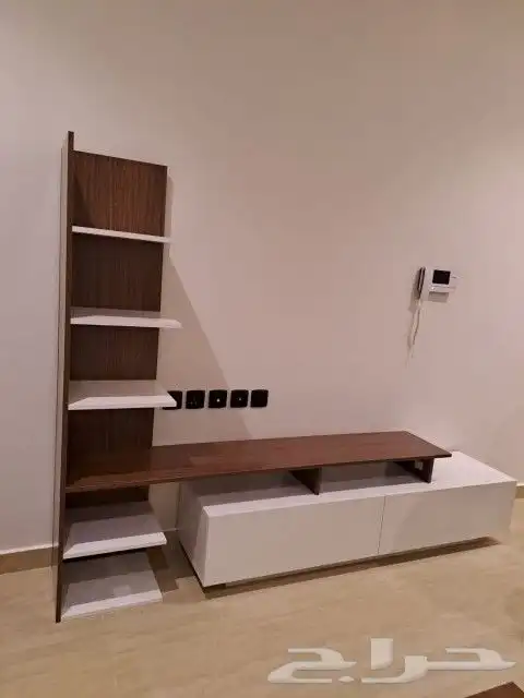 طاولات تلفزيون معلقه بتصميم أنيق وأحجام متنوعه 15