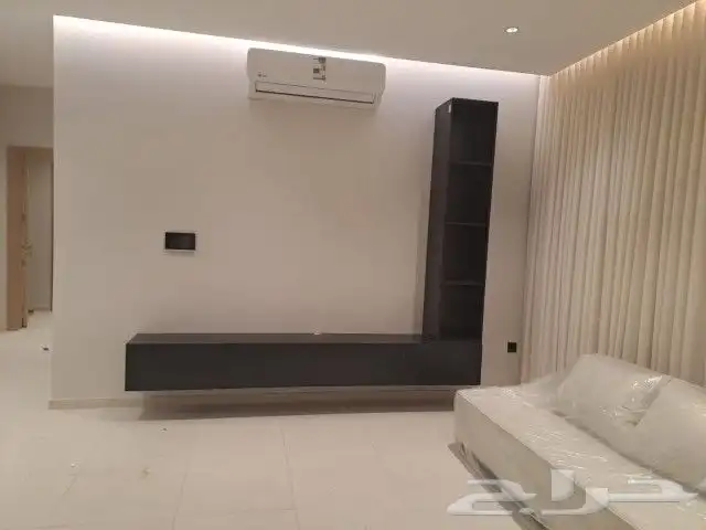 طاولات تلفزيون معلقه بتصميم أنيق وأحجام متنوعه 12