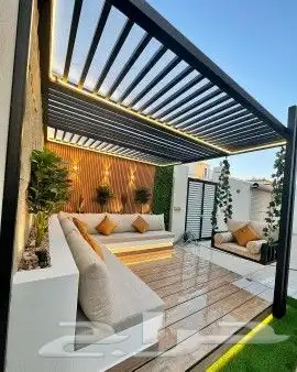 عشب صناعي وشلالات ومظلات 2