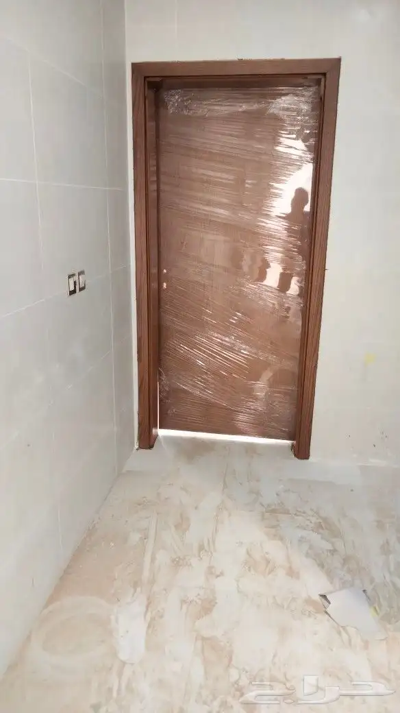 دهان أبواب ميجنو بتبوك ابواب حديد 7