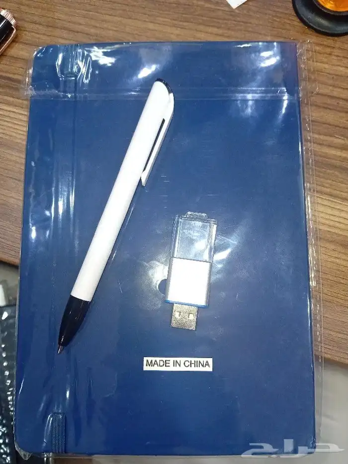 هدايا.نوت بوك.أقلام.فلاش 2