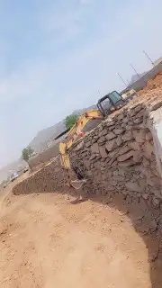 بوكلين بناء الحجر وقص الارضي 0