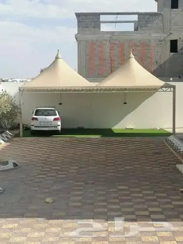 مظلات وسواتر نيوم 10
