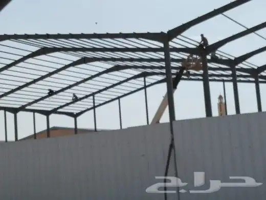 إنشاء هياكل معدنية ومخازن ومستودعات هناجر ساندوتش بانل 16