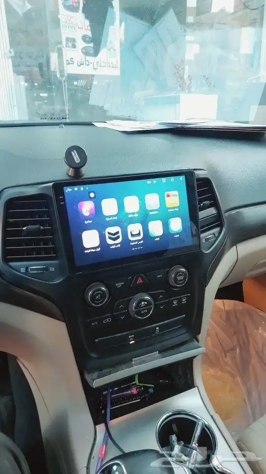 تركيب شاشه جيب شروكي 2014 0