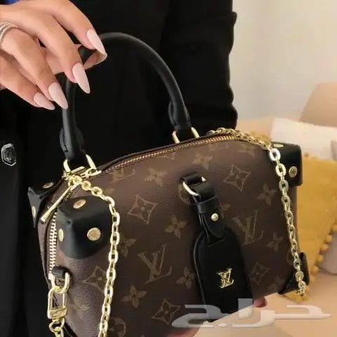 شنط سان لورا قوتشي 48