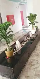 تنسيق_حدائق عشب_صناعي شلال جلسة مظلة جداري زراعة زرع احواض 4