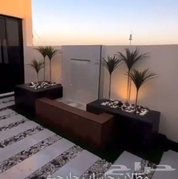 تنسيق_حدائق عشب_صناعي شلال جلسة مظلة جداري زراعة زرع احواض 1