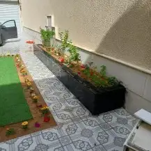 متخصصون في مجال العشب الصناعي 9
