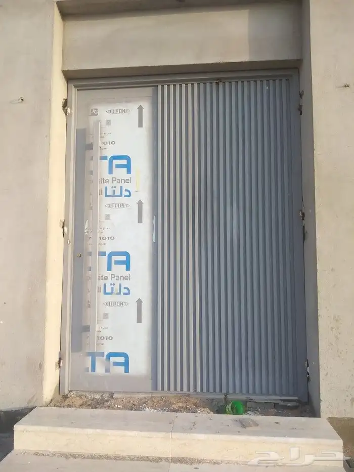 أبواب حديد مع كلادنج 0