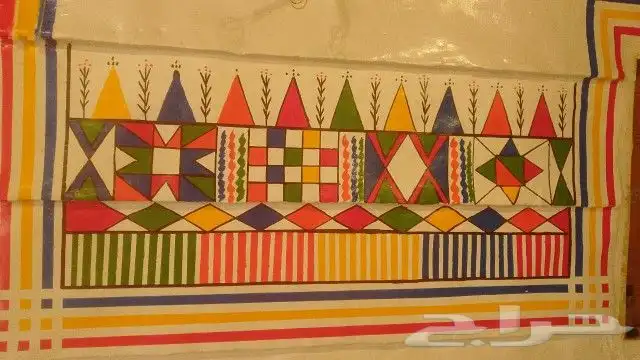 قط عسيري وترميم بيوت الطين 3