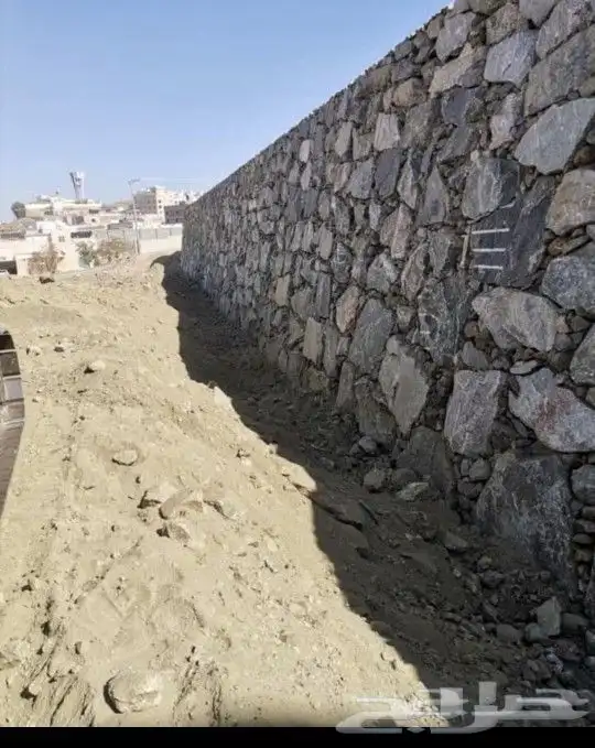 بنيان حجر بوكلين قص اراضي حفريت خزانات 0