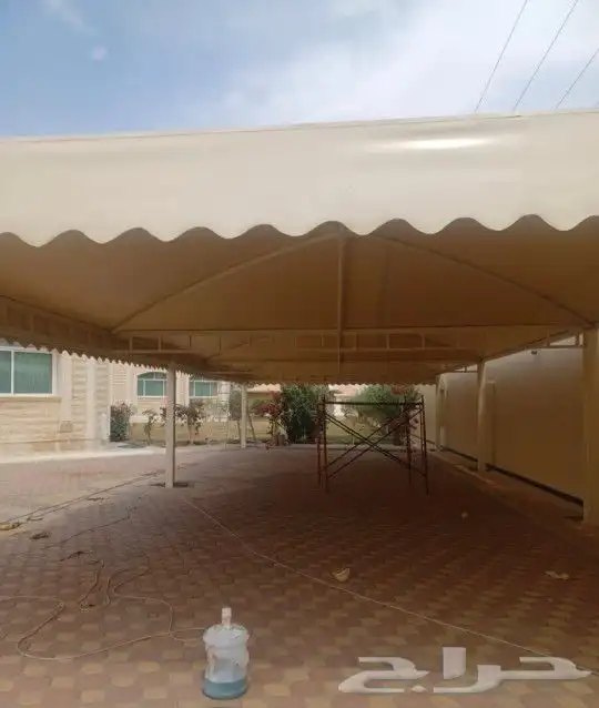 مظلات مواقف سيارات مجالس قزاز مجالس سندويتش بلن معزول 1