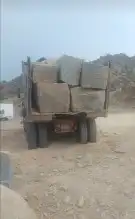 بوكلينات وقلابات بنا الجدران الحجر بانواعه وقص وردم الأراضي 23