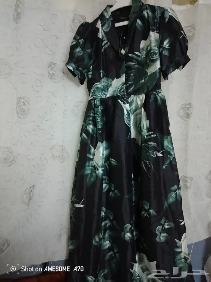 فساتين وشنط وجزم جديدة لم يتم لبسه 4