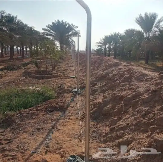 تنفيذ اعمال شبوك المزارع والاراضي البيضاء وزراعت النخيل العر 0