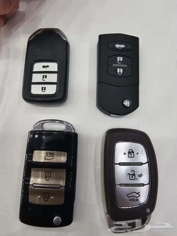 نسخ وقص وتفصيل مفاتيح سيارات برمجه جميع السيارات فتح شقق 7