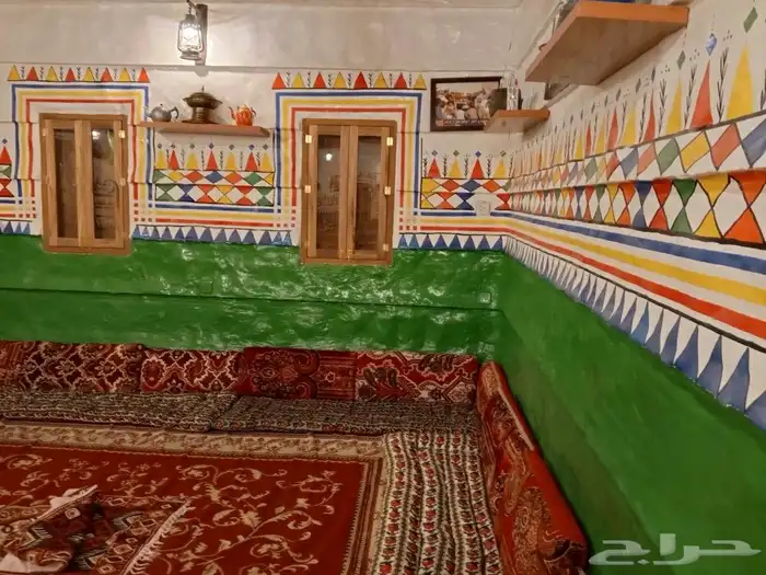 ترميم بيوت الطين مع القط العسيري 8