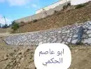 بناء حجر بوكلين شيول تكحيل تلجيم ربراب إنجاز في العمل جدران 2