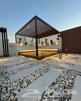 تنسيق حدائق بالأحساء شلالات ونوافير باركيه خارجي 5