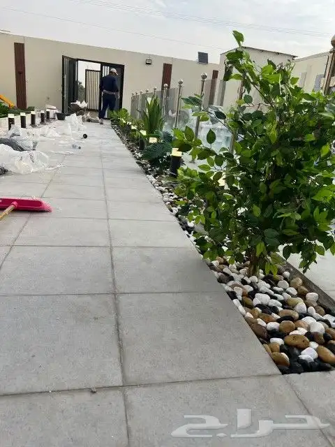 تنسيق حدائق بالأحساء شلالات ونوافير باركيه خارجي 3