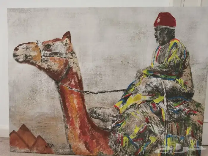 لوحة موقعه رسم يدوي أعرابي يمتطي بعيرا 0