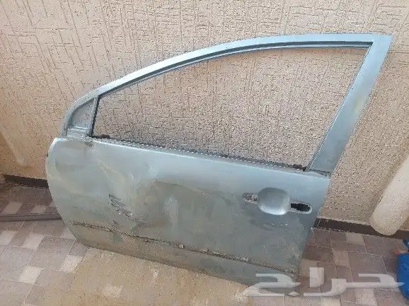 باب السواق كورلا موديل 2005 للبيع 1