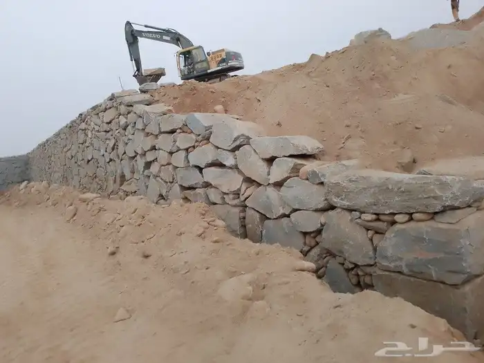 بوكلين لبناء الحجر وقص الأراضي والحفر والهدم 49
