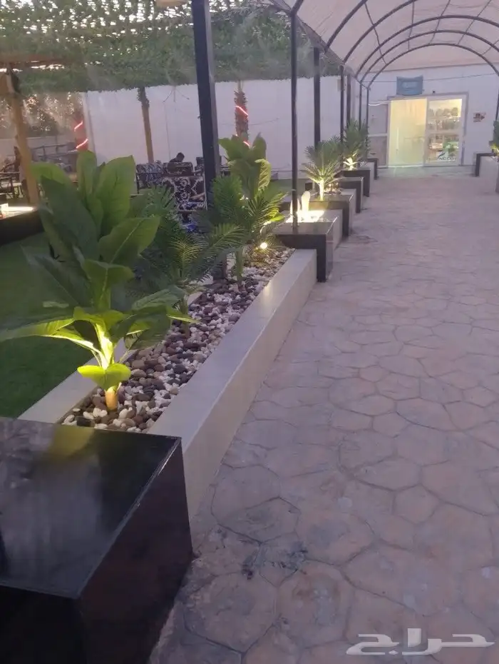 تنسيق حدائق شلالات نوفير مظلات ثيل طبيعي 3