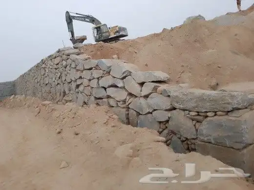 بوكلين لبناء الحجر وقص الأراضي والحفر واالهدم 44