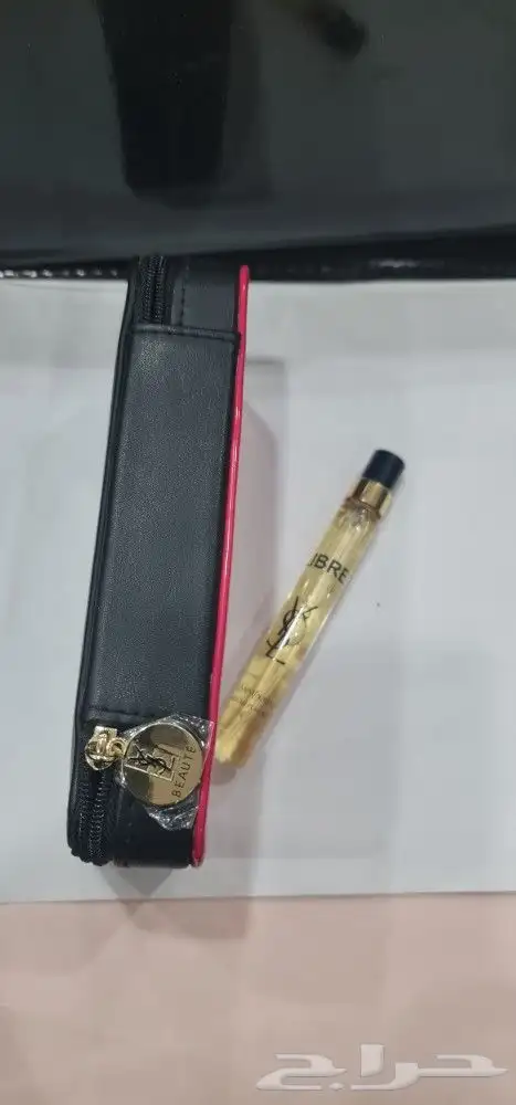 شنطة مكياج من افسان لوران مع عطر ليبر ابسلو بلاتين 10ملي 2