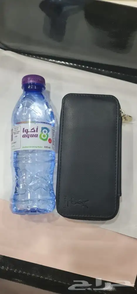 شنطة مكياج من افسان لوران مع عطر ليبر ابسلو بلاتين 10ملي 4